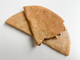 Thin crepes, half round shape, with chocolate filling