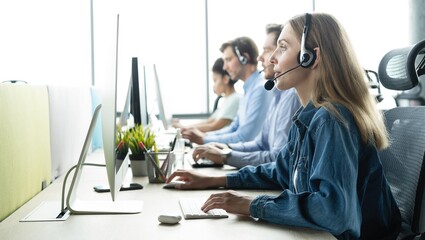 Colleagues working in a call center. - Powered by Adobe