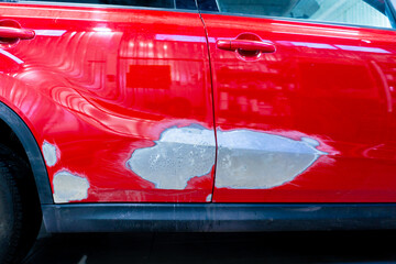 painting works paint removal and rust removal from car parts service station detailing