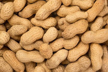 Background image of raw peanuts from above
