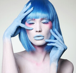 Beautiful girl with Blue Hair and Paint. beauty young woman