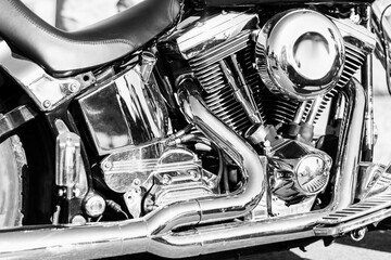 Detail of a classic motorcycle. Black and white photo.