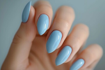 Glamour woman hand with blue nail polish