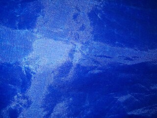 Blue plastic background with light