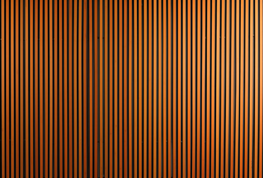 Wooden panel background with vertical stripes.Modern pvc wood wall panel.