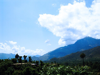 Mountain With Cloudy Blue Sky