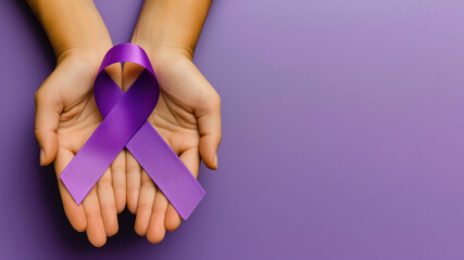 Two hands holding awareness ribbon, purple background, top view, copy space on the right - obrazy, fototapety, plakaty