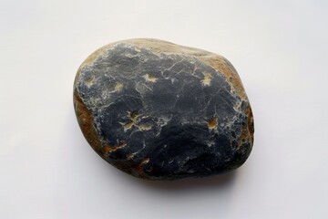 Natural stone with yellow star patterns on a white surface