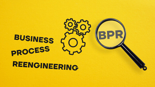 Business Process Reengineering BPR is shown using the text and photo of magnifying glass