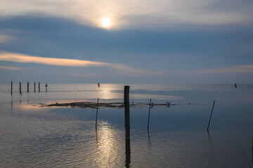 Obraz premium Panorama della laguna di Venezia al tramonto vista dall'isola di Pellestrina