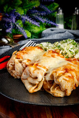 Stuffed pancake baked with cheese.