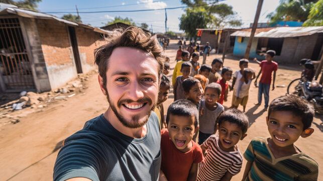 Smiling man taking a selfie with kids / children in the middle east on the playground.