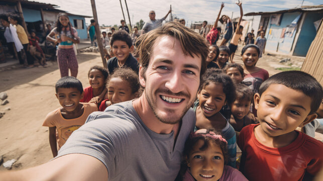 Smiling man taking a selfie with kids / children in the middle east on the playground.
