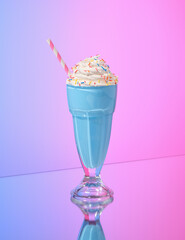 Blue milkshake with colored sprinkles and straw. Sweet and festive.