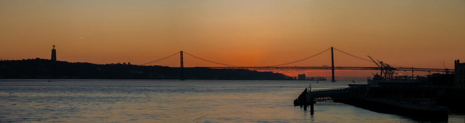 Stunning Sunset over the Tagus River Bridge, Lisbon, Portugal