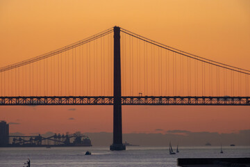 Stunning Sunset over the Tagus River Bridge, Lisbon, Portugal