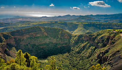 The collpased Bandama caldera now covered in lush vegetation, Gran Canaria, Canary Islands, Spain - obrazy, fototapety, plakaty