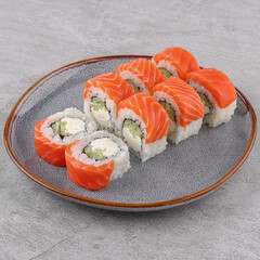 delicious rolls with salmon on a white background studio shooting 1