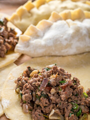 Close-Up of Preparing Homemade Beef Stuffed Empanada - Captivating 4K Ultra HD Image of Culinary Creation