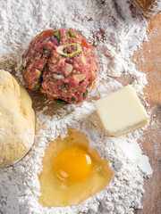 Preparing Homemade Beef Stuffed Empanada with egg - Culinary Delight in Vibrant 4K Ultra HD