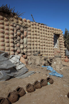 pottery, houses, rubish in a village