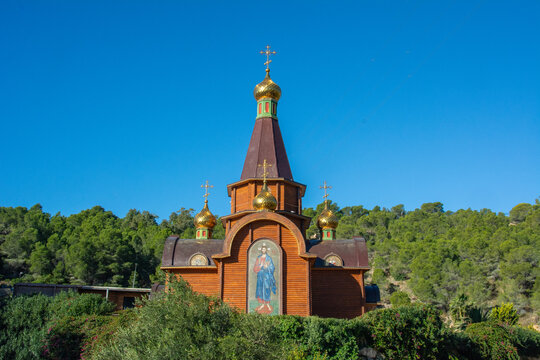 Exterior view Russian Orthodox Church of the Archangel Michael built in the style of Russian wooden architecture with golden cupolas in the Altea Hills urbanization, Altea, province of Alicante, Spain