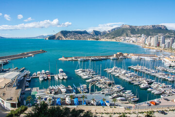 View of the Port Pesquer el Raco port and marina on the Mediterranean Sea in Calpe seen from Penyal...