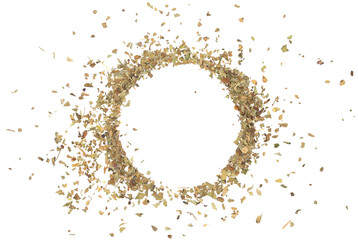 Dried and chopped up basil spice pile isolated on white background, top view