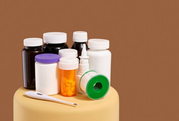 Biologically active additives, pills and capsules. Thermometer and adhesive plaster. Copy space for text.