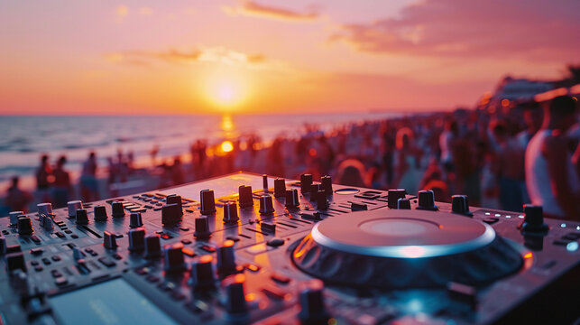 Beach party festival with dj mixing, Close up portrait of dj mixer table with beautiful evening sunset at tropical beach