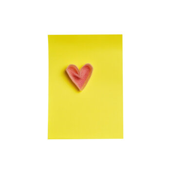yellow sticky note with heart
