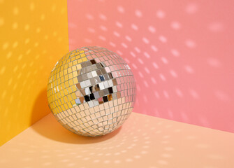 Mirrored glowing disco ball and party. Copy space for text.