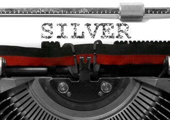 glitter Text SILVER written with the vintage typewriter
