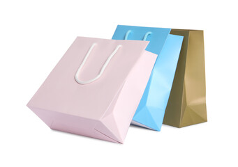Colorful paper shopping bags isolated on white