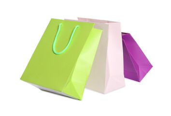 Colorful paper shopping bags isolated on white