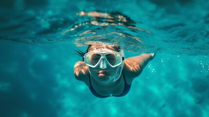 Fototapeta premium person snorkeling in the ocean