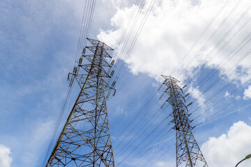 Pylon and high voltage powerline over the blue sky
