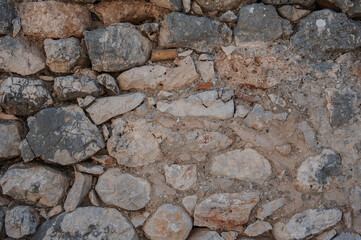 Ancient wall background with old concrete bricks