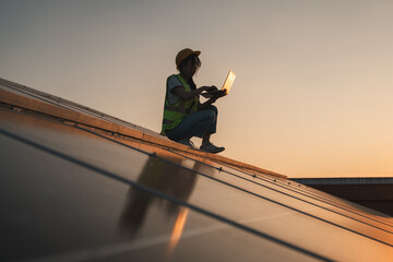 Service engineer checking solar cell on the roof for maintenance if there is a damaged part. Engineer worker install solar panel. Clean energy concept.