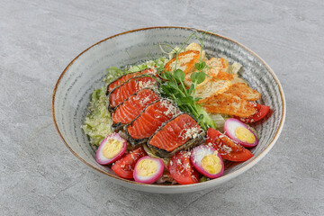 Salmon salad on a stone background studio shooting 1