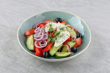 Greek salad on a stone background studio shooting 3