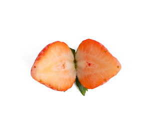 Strawberries cut in half on a white background. Strawberries close up.