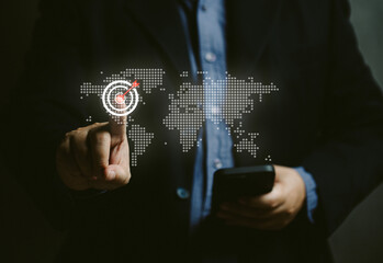 .man points virtual screen at world map and set goals. Marketing planning goal strategy concepts. Business management for growth achievement development. World global target performance.