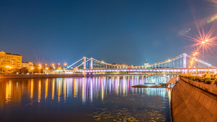 Panoramic view of night Krymsky (Crimean) bridge in Moscow, Russia