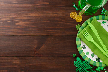 Radiant green affair: St. Patrick's extravaganza. Top view of paper plates, cutlery, green beer,...