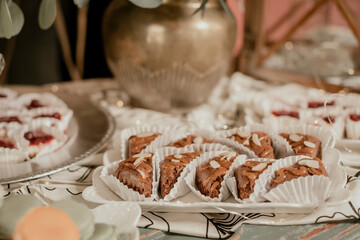 Tasty Chocolate Brownies, Portions With Caramel Sauce, And Peanuts.