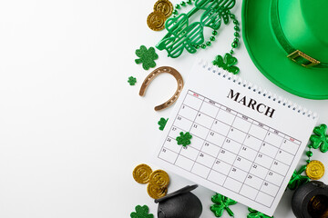 Vibrant emerald radiance: prepare to St. Patrick's Day. Top view shot of calendar, pots, party...