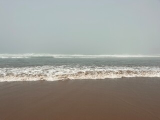 foggy ocean coast, fog at the ocean beach