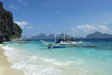 Boat on a beach in the bacuit archipelago, Philippines