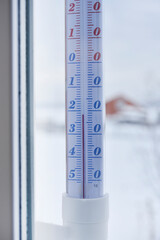 Alcohol street thermometer. The temperature meter. The temperature is low outside.